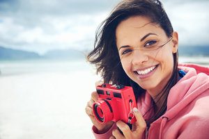 Woman Hold a Camera